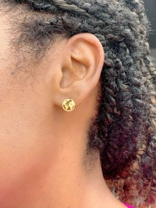 Gold Globe of the World stud earrings - Image 2