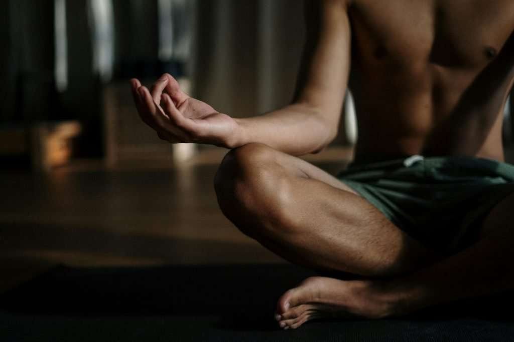 man in yoga pose