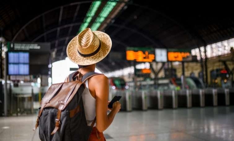 a woman in an airport arrival