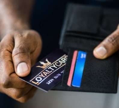 a man holding a card