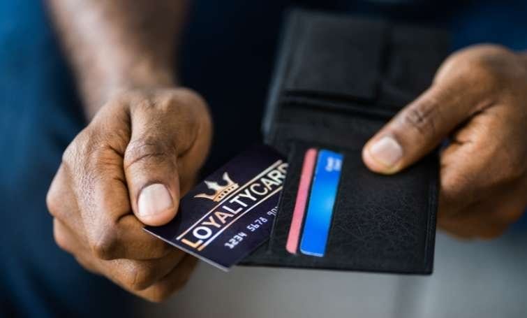 a man holding a card