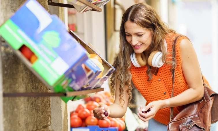a woman buying in a small business