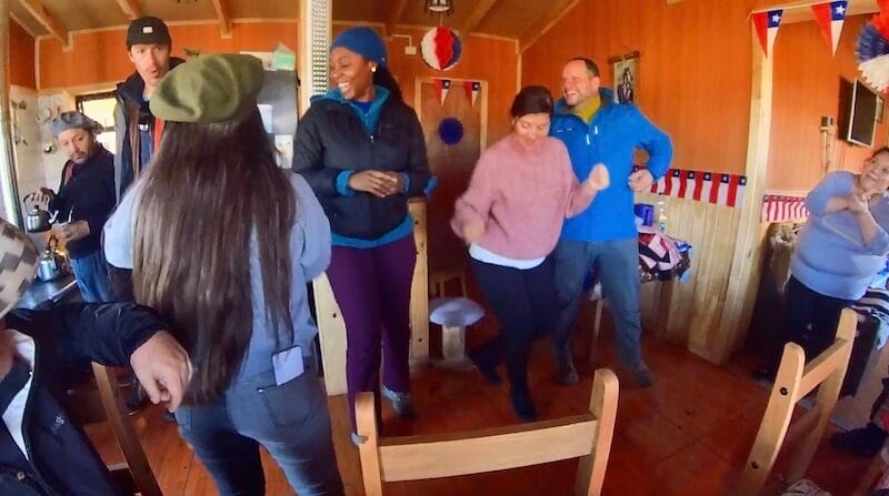 Dayvee celebrating in Patagonia with locals