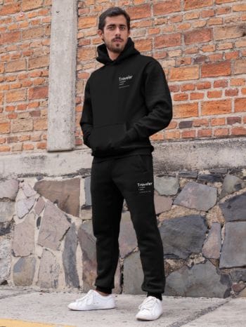 pullover-hoodie-mockup-featuring-a-man-with-sweatpants-by-a-brick-wall-29847