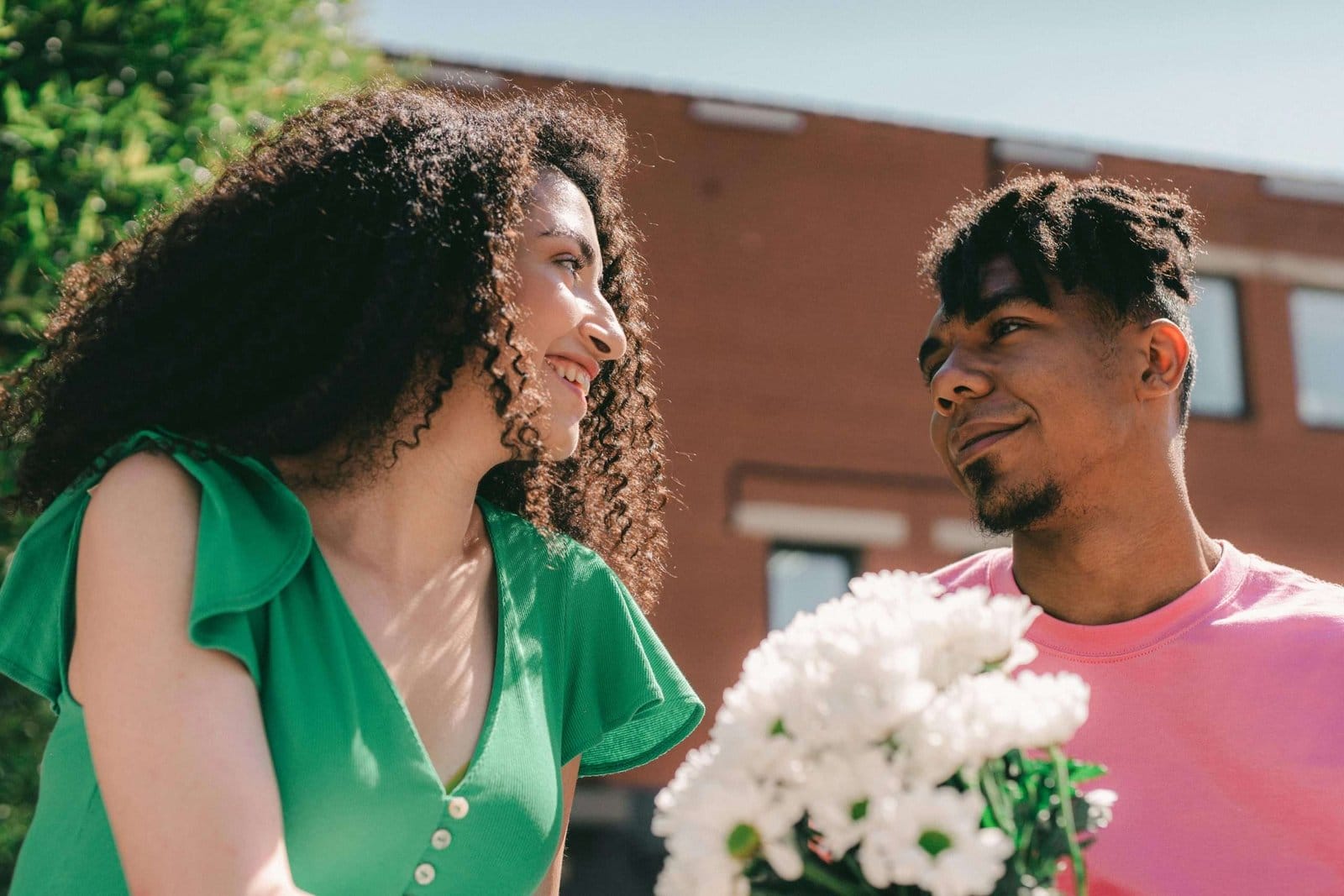 couple sharing flowers